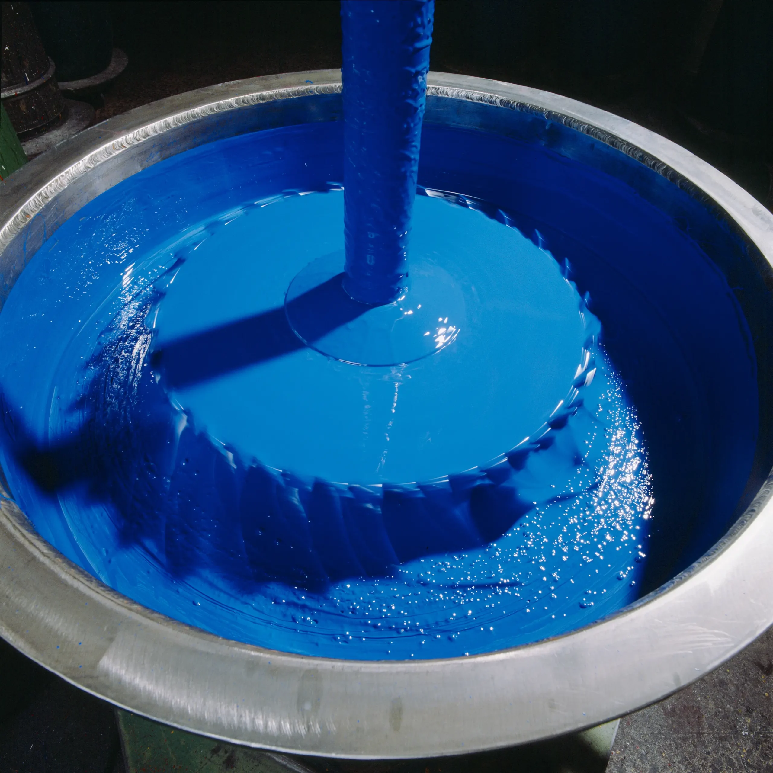 Blue lacquer is produced by mixing purified lacquer resin with blue pigments and solvents, applying it to surfaces, and allowing it to dry and cure.