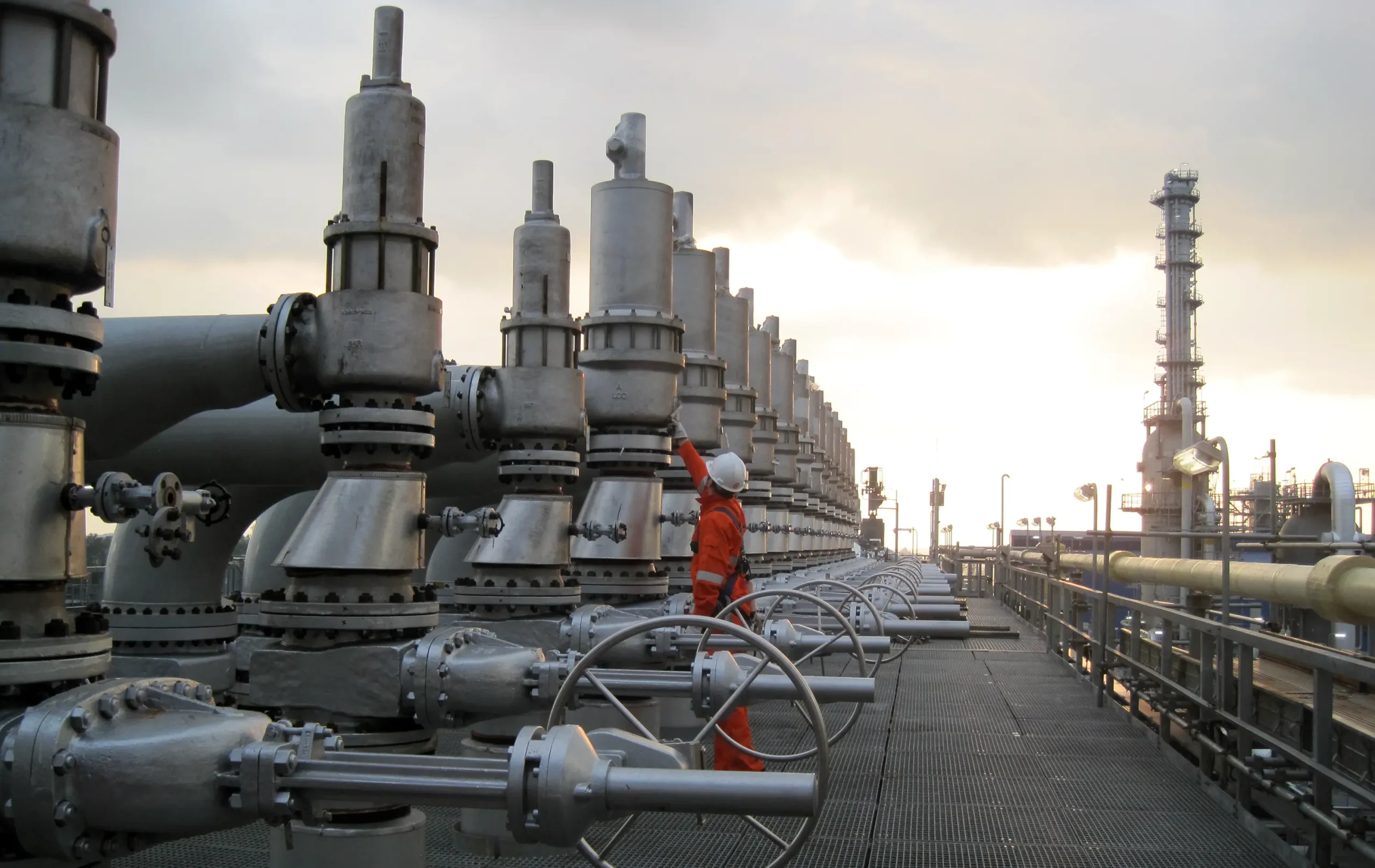 An IMI Bopp and Reuther engineer inspecting a safety valve installed at a plant in Europe.