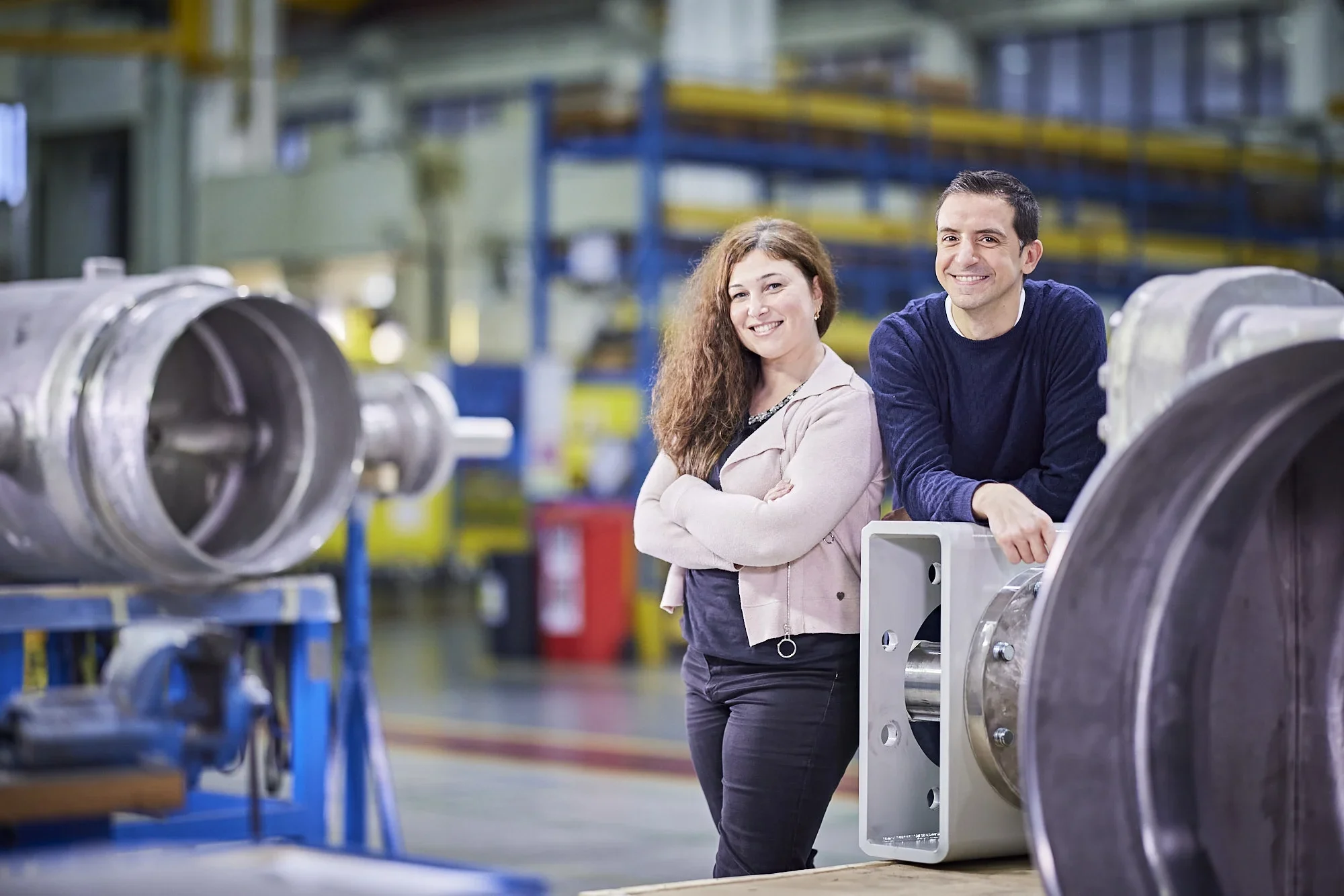 In an Italian manufacturing facility, employees from IMI, a leading company in the industry, pose with isolation valves.